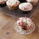 strawberries and cream cheese muffins on wire rack