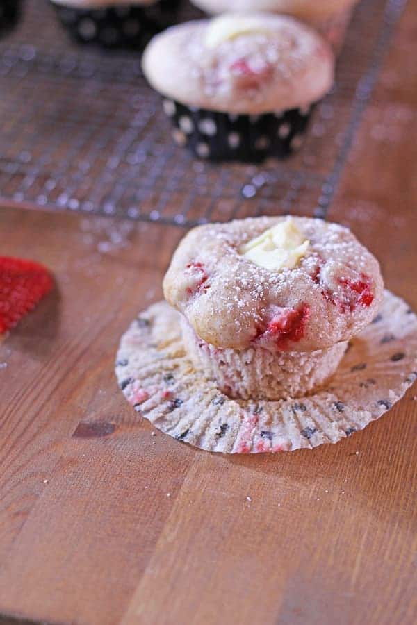 Strawberry and Cream Cheese Muffin in an open muffin liner