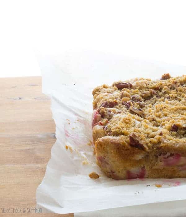 Piece of Rhubarb Coffee Cake on parchment paper