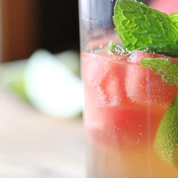 side view of virgin watermelon sangria with fresh mint