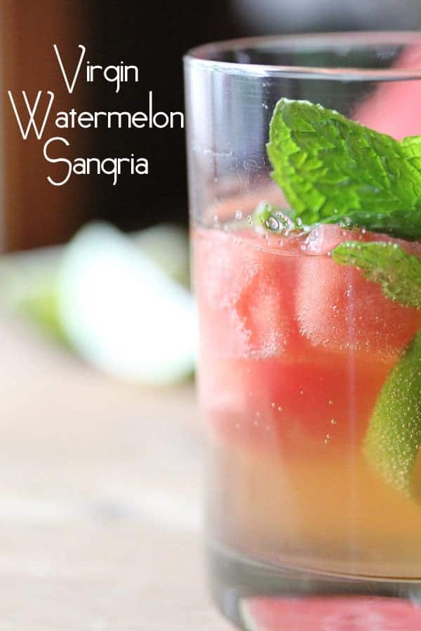 Virgin Watermelon Sangria in a glass with fresh mint sprig