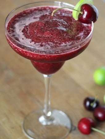frozen cherry limeade in margarita glass