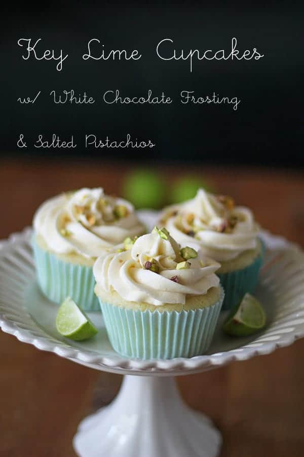 Key Lime Cupcakes with White Chocolate Frosting and Pistachios on a white cake stand