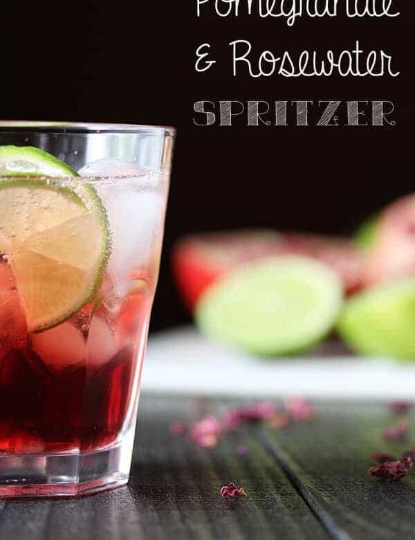side view of pomegranate rosewater spritzer in glass