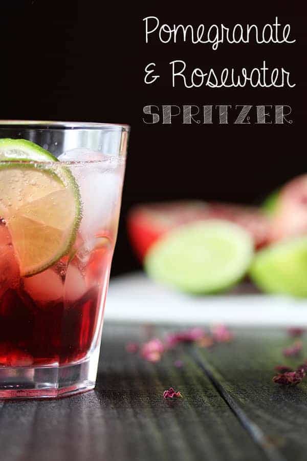 Pomegranate and Rosewater Spritzer in a glass with fresh lime slice