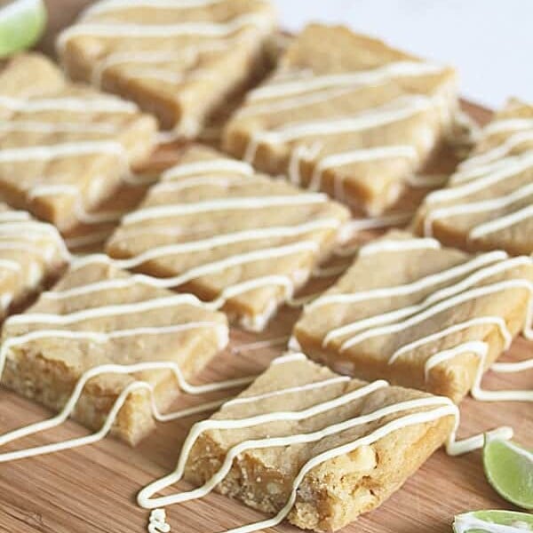 rows of key lime white chocolate blondies on wood board