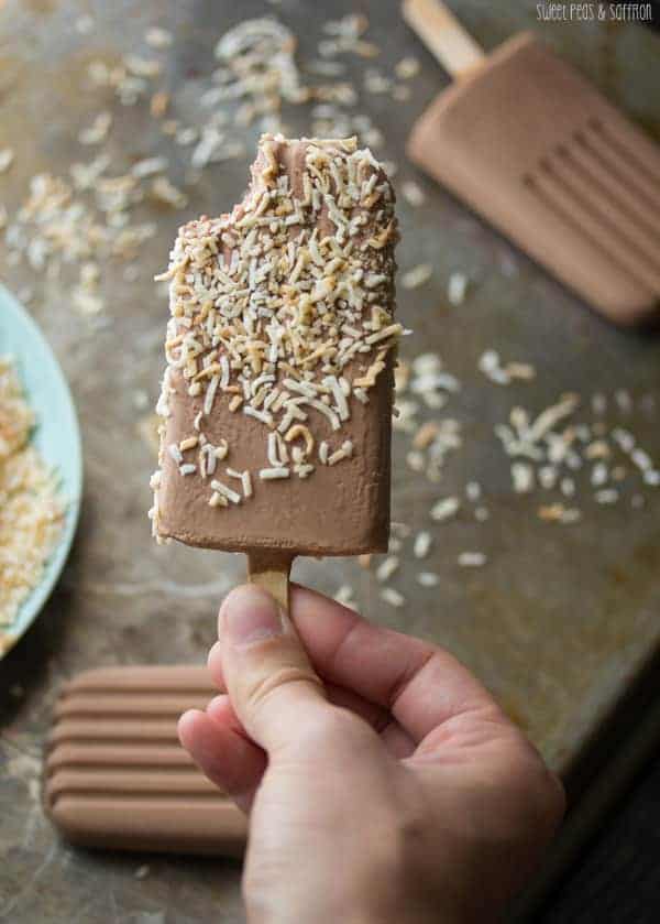 Close up shot of Coconut Nutella Popsicle with a bite taken out
