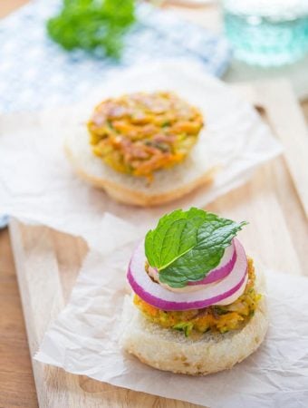 open face mini moroccan chickpea burgers with spicy harissa mayo on parchment