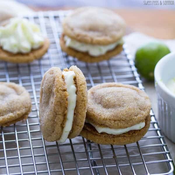 Four Key Lime Pie Sandwich Cookies arranged on a wire rack