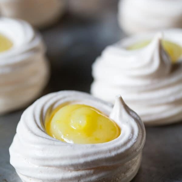 close up of lemon meringue pie bites on sheet pan