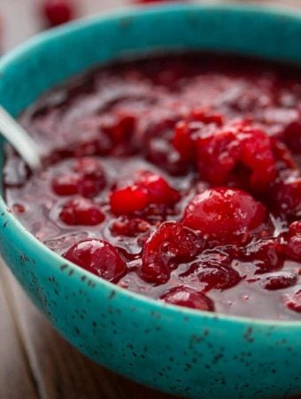 raspberry balsamic cranberry sauce in blue bowl
