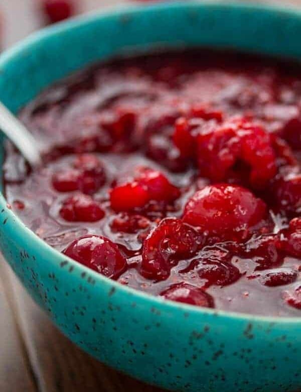 raspberry balsamic cranberry sauce in blue bowl