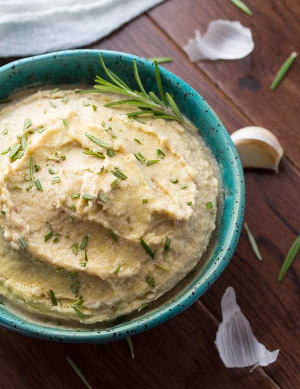 overhead view of white bean hummus in bowl