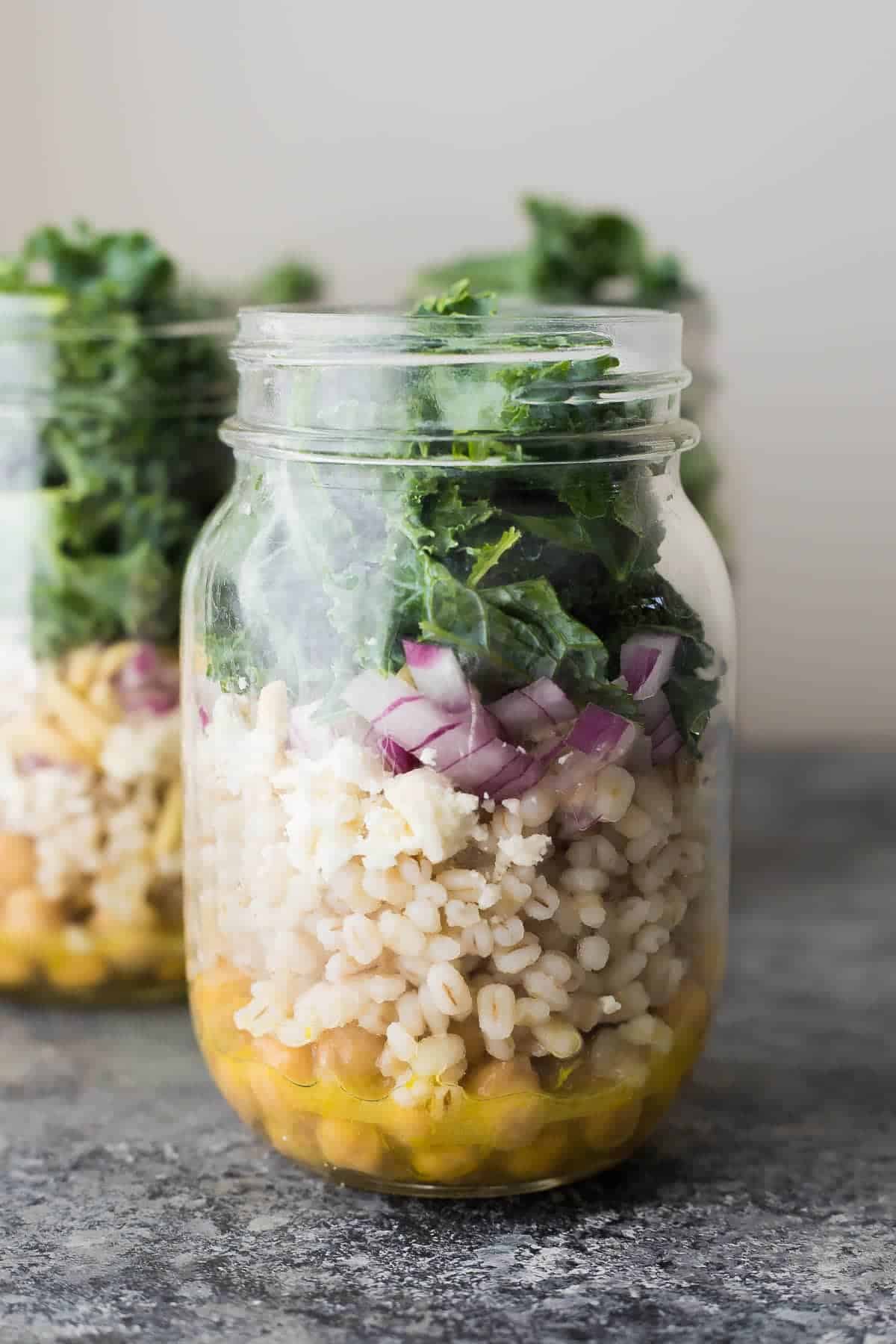 kale barley salad in jars for meal prep