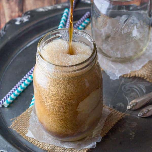 Spiced Baileys Root Beer Float in mason jar arranged on serving tray
