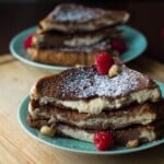 mascarpone stuffed french toast stacked on two blue plates