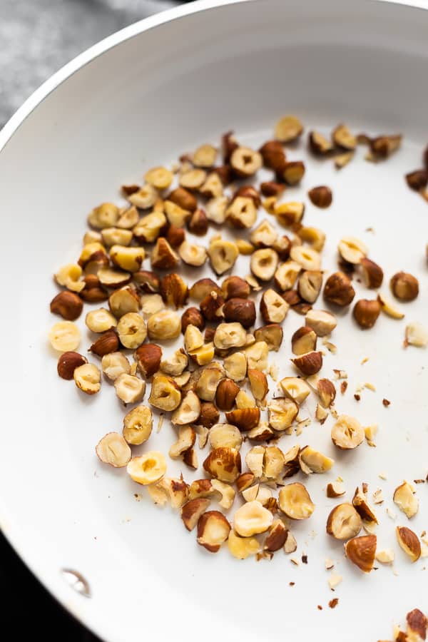 toasting the hazelnuts for the pear salad recipe