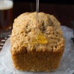 honey rye beer bread with honey drizzled on it