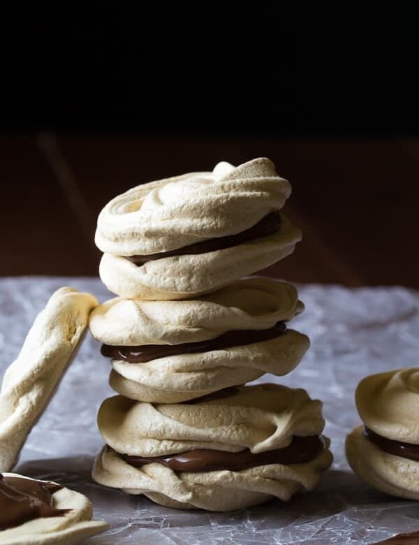 side view of stack of coffee nutella meringue sandwiches