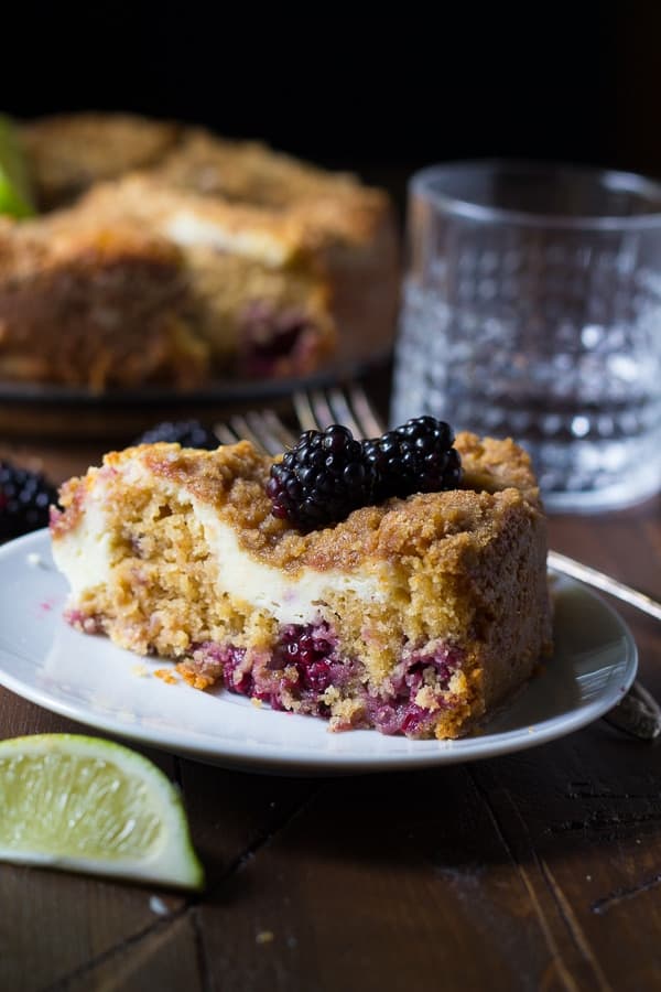 slice Cream Cheese Swirl Blackberry Coffee Cake on a plate