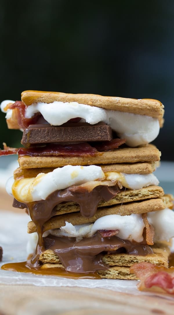 side angle view of a stack of caramel bacon s'mores