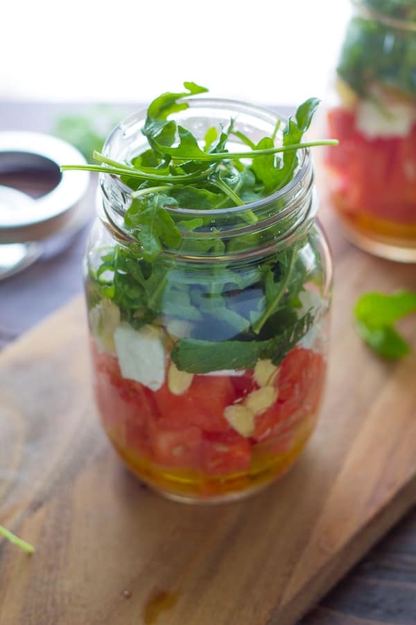 side angle view of Arugula and Watermelon Salad in a Jar