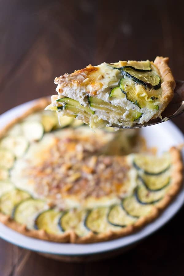 slice of zucchini ricotta quiche on a spatula