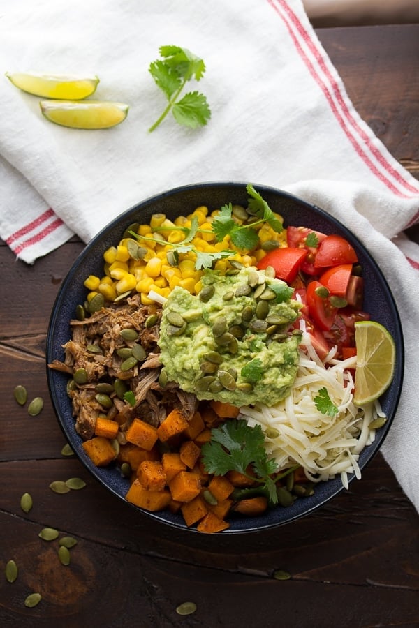 Maple pulled pork burrito bowls with sweet potatoes and pepitas