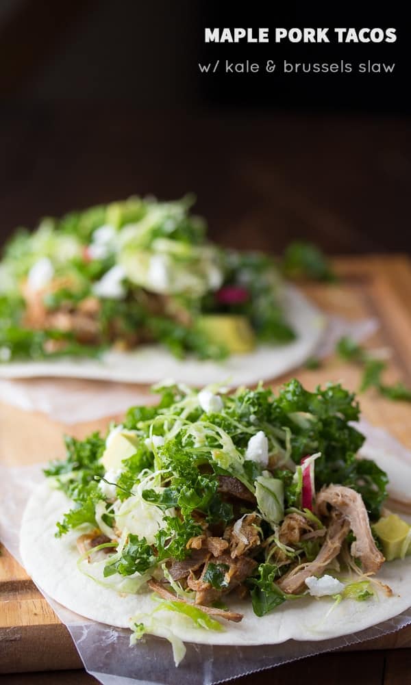 side view of maple pork tacos topped with brussels sprouts slaw