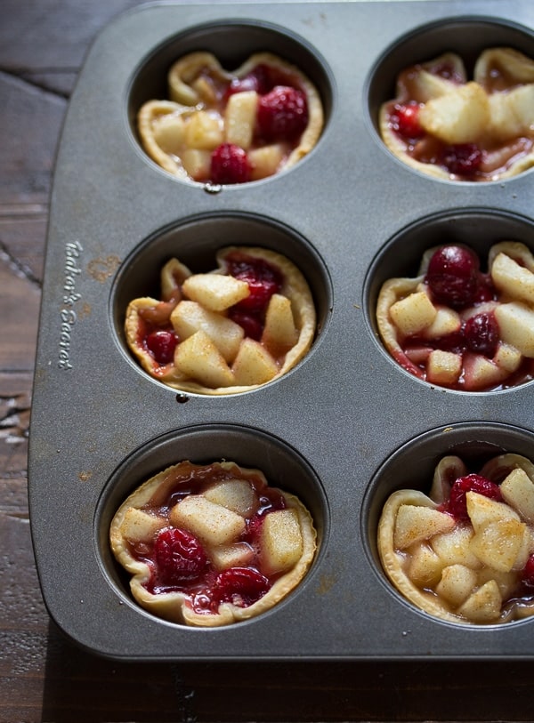 mini pies in muffin tin after baking