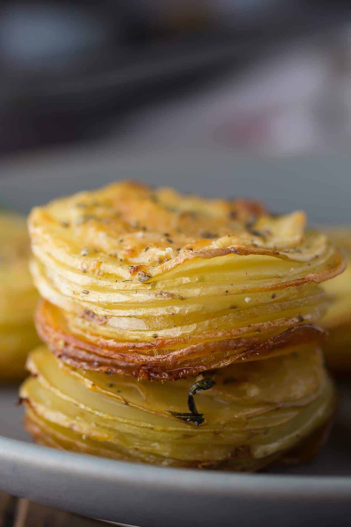 side angle and close up view of potato stack on plate