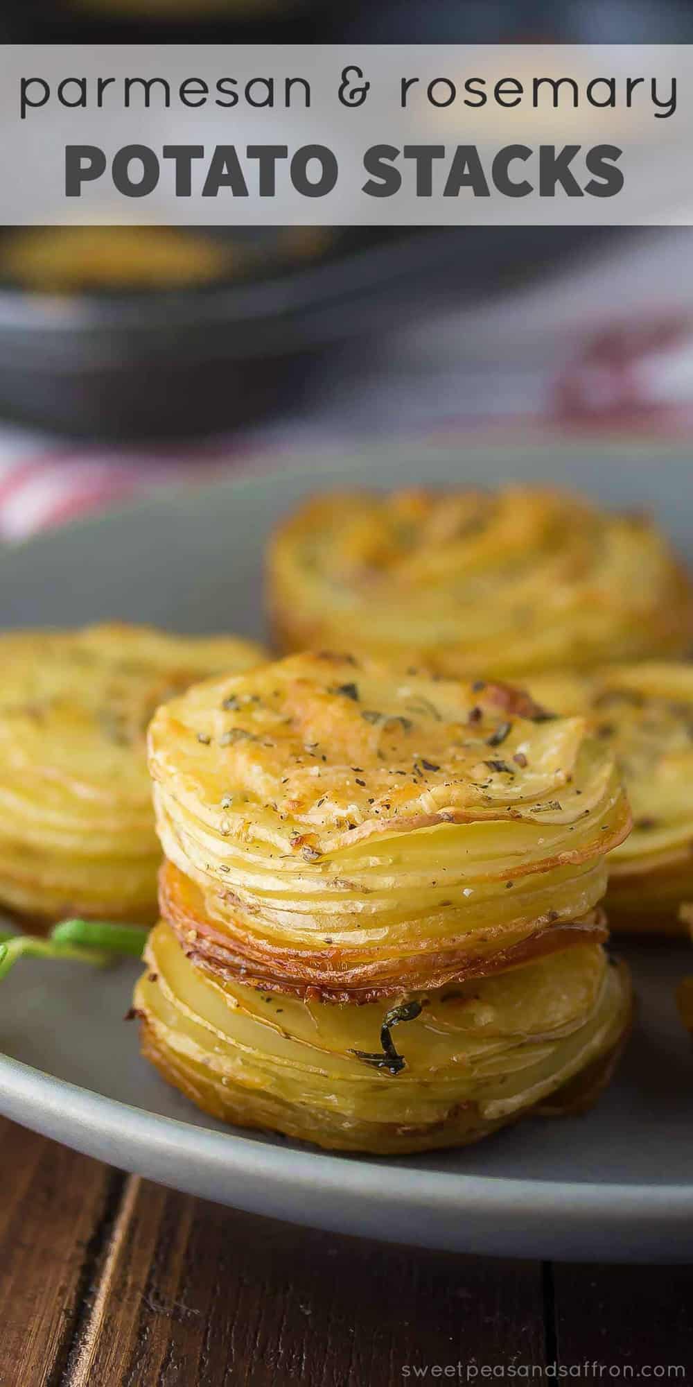 parmesan rosemary potato stacks on grey plate