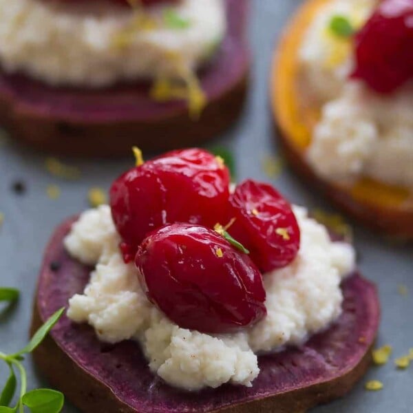 close up shot of sweet potato ricotta and cranberry crostini