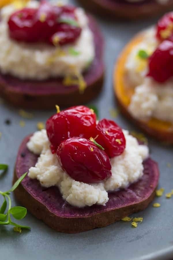 close up shot of sweet potato ricotta and cranberry crostini