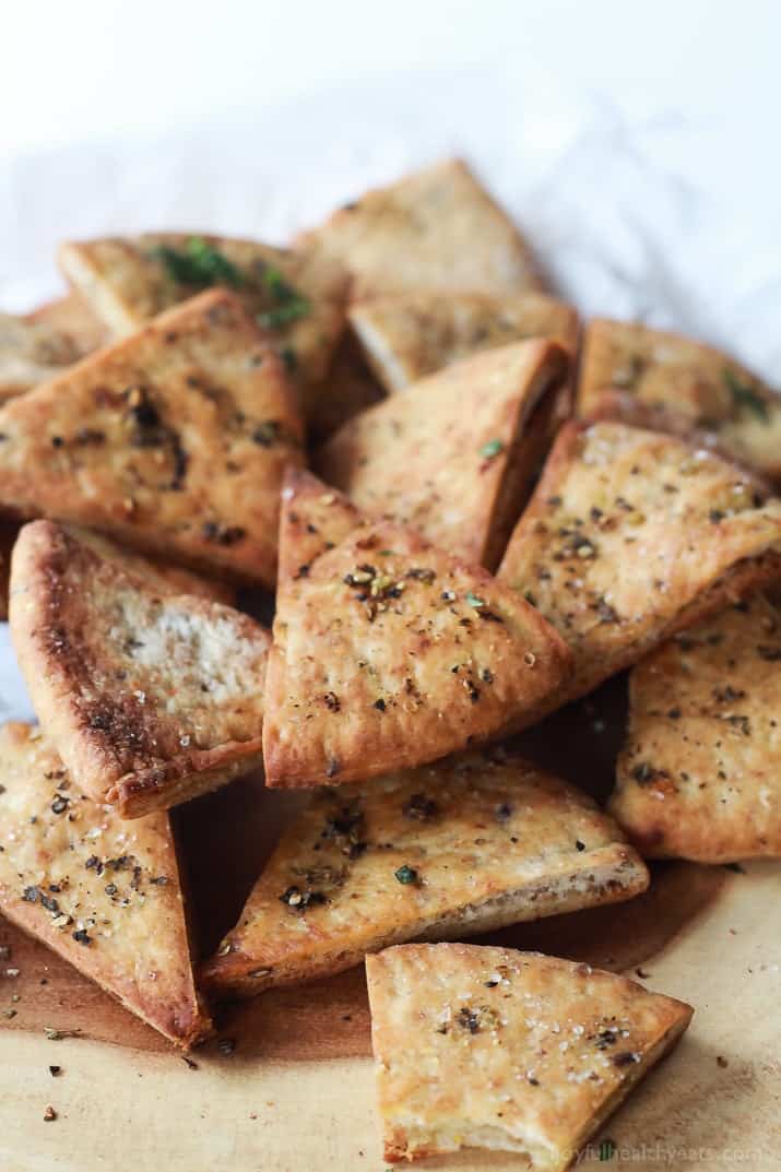 baked pita chips on cutting board