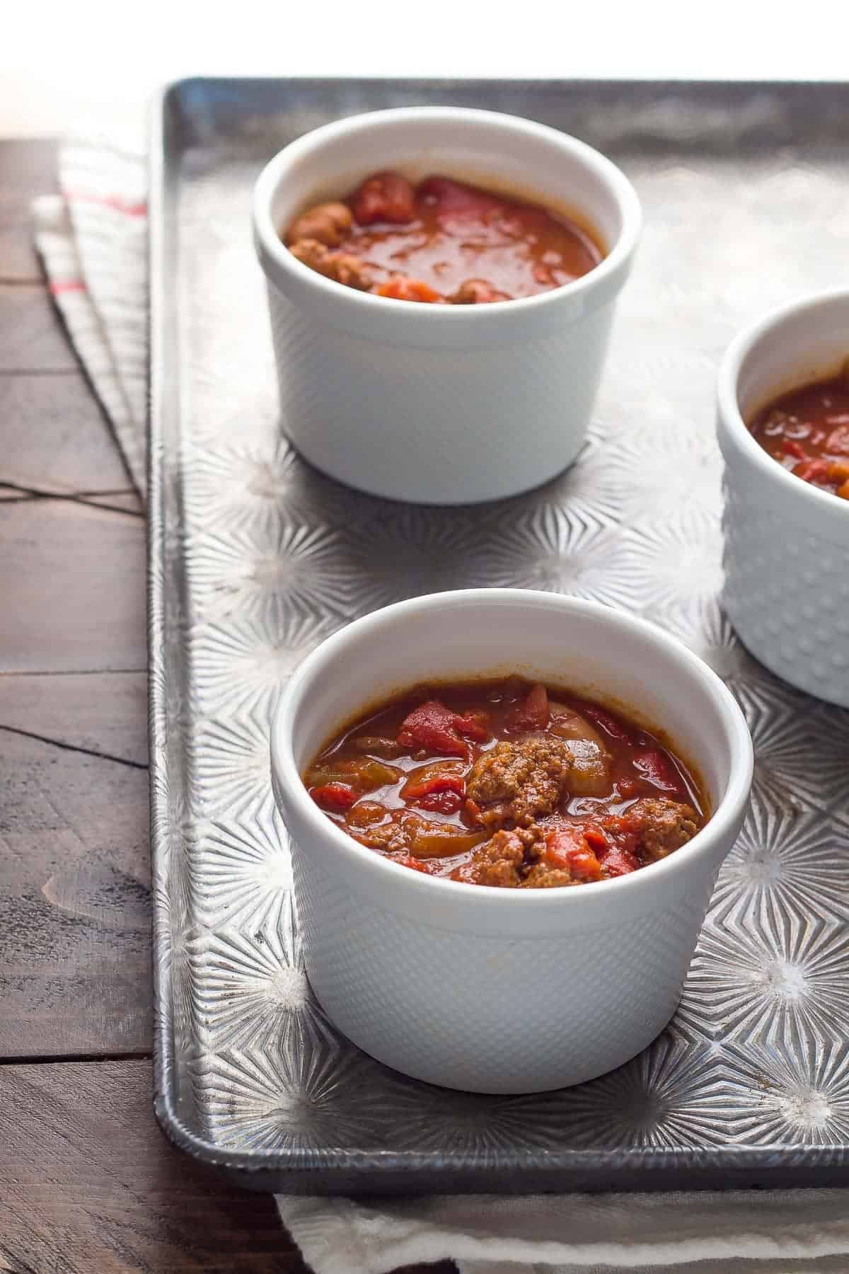 A simple recipe to use up leftover chili! Baked up in a personal-sized portion, and topped with a delicious cornbread topping!