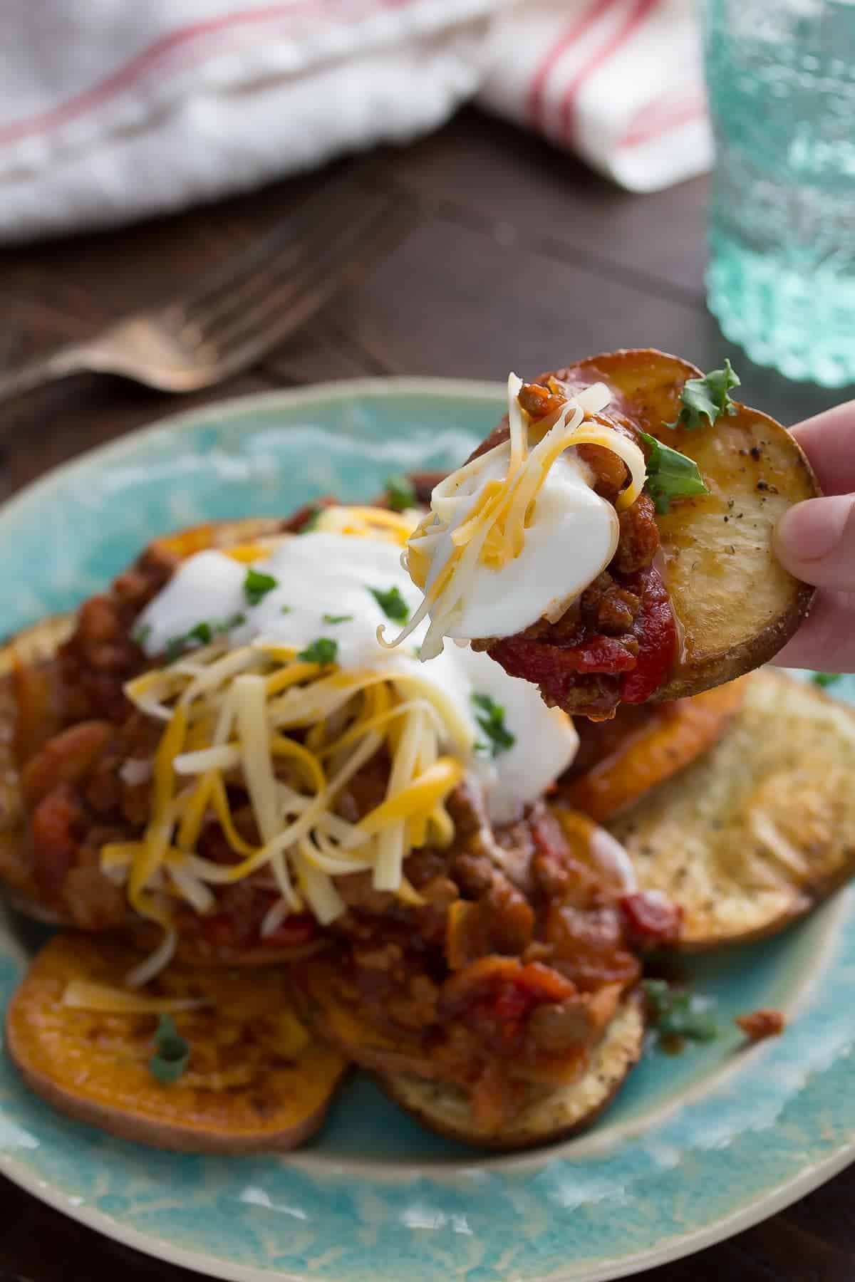 Use up your leftover chili with these simple potato nachos! Perfect for a snack or for dinner!