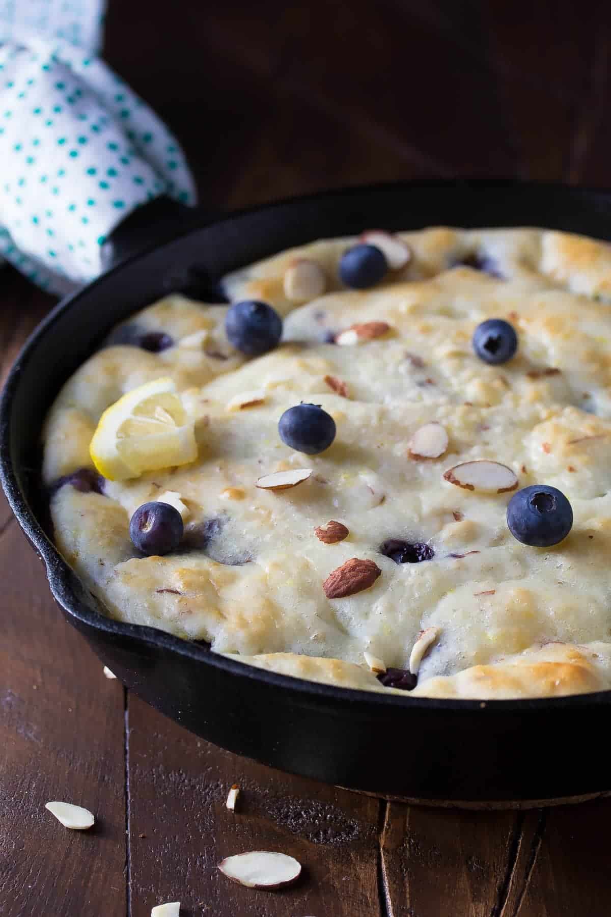 Deep Dish Blueberry-Almond Pancakes, an easy hands off healthy breakfast or brunch recipe! With blueberries, almonds and lemon zest.