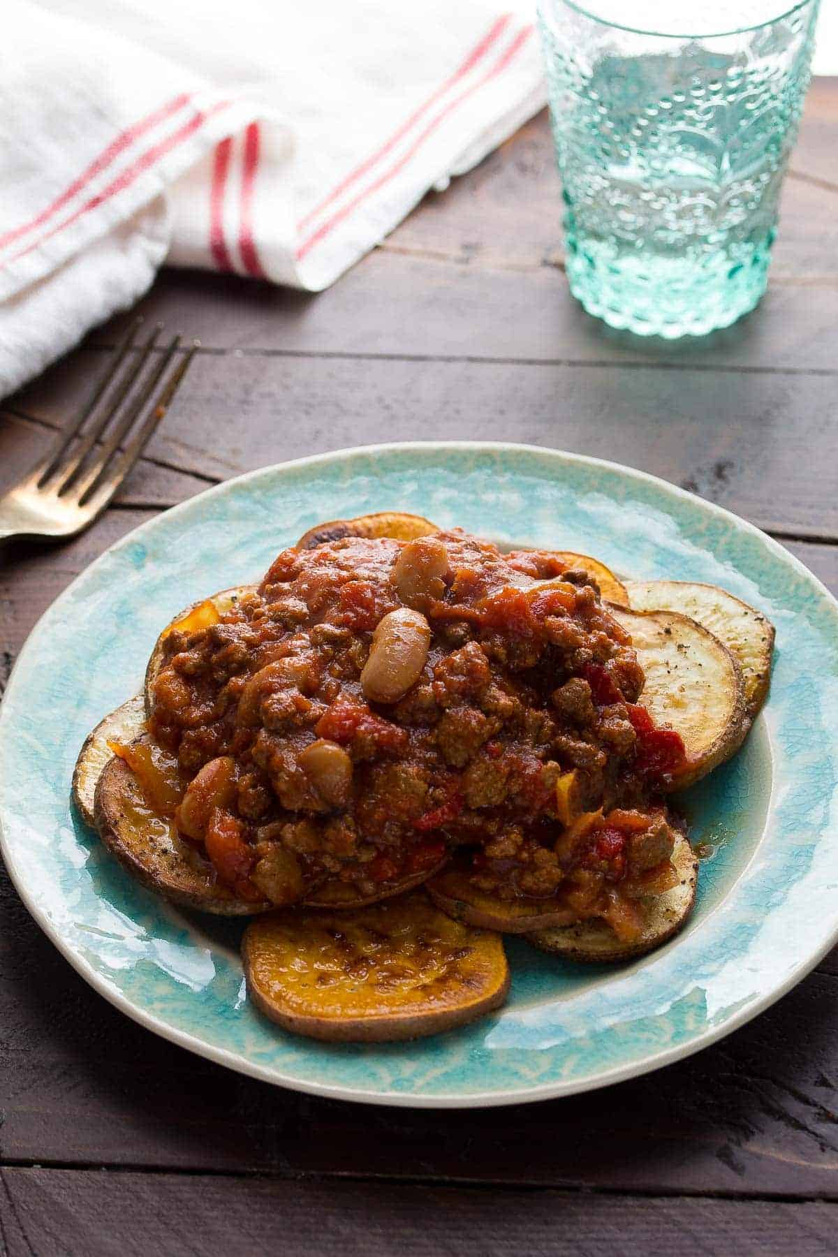 Use up your leftover chili with these simple potato nachos! Perfect for a snack or for dinner!