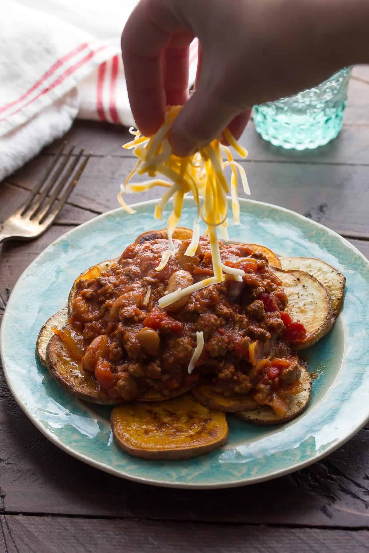 Use up your leftover chili with these simple potato nachos! Perfect for a snack or for dinner!