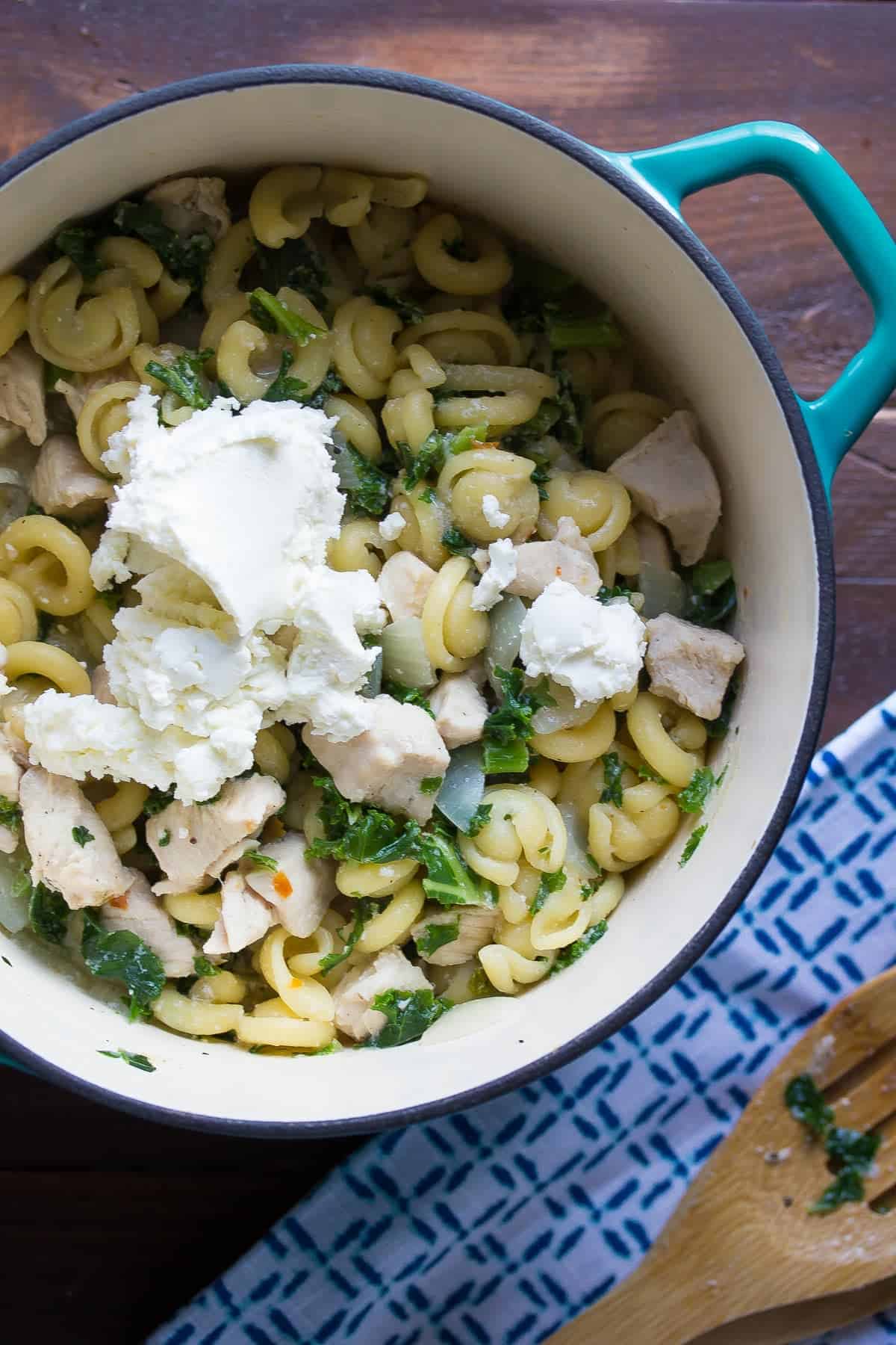 One Pot Pasta with Kale, Goat Cheese, Chicken and Pine Nuts. An easy week-night dinner recipe that is ready in 30 minutes! 