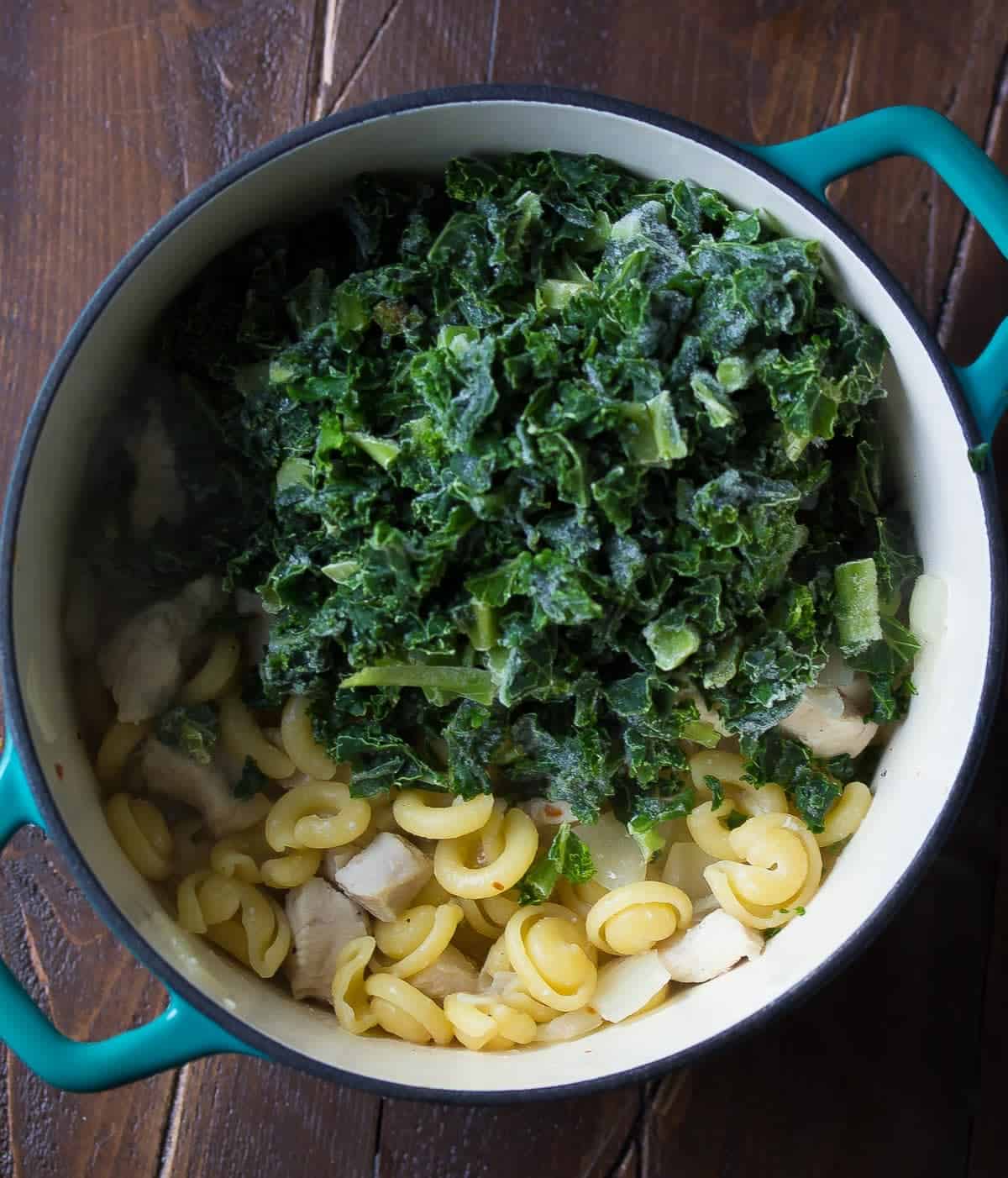 One Pot Pasta with Kale, Goat Cheese, Chicken and Pine Nuts. An easy week-night dinner recipe that is ready in 30 minutes! 