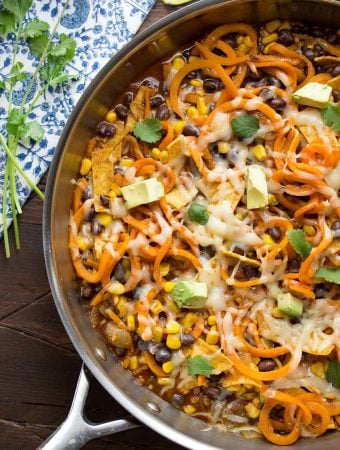 overhead shot of enchilada sweet potato noodles skillet in large pan on table