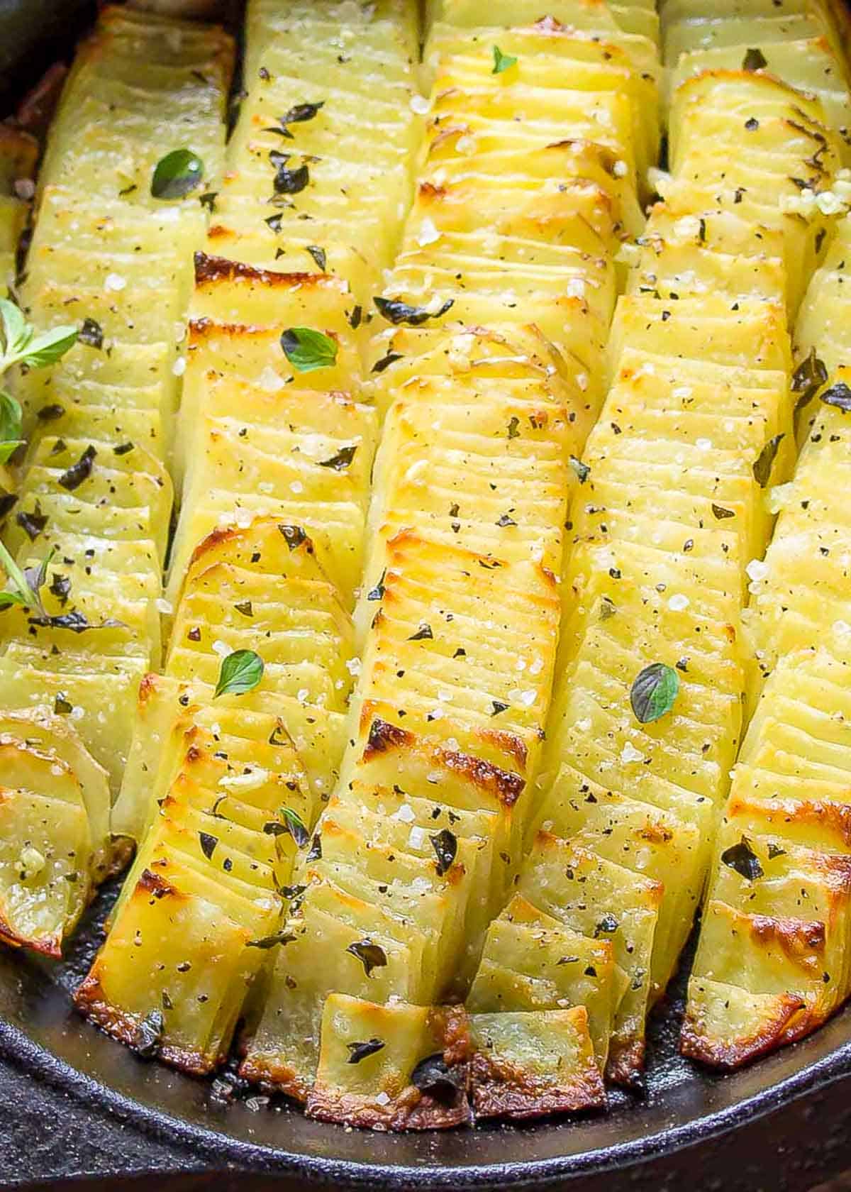 thinly sliced crispy domino potatoes in a dish