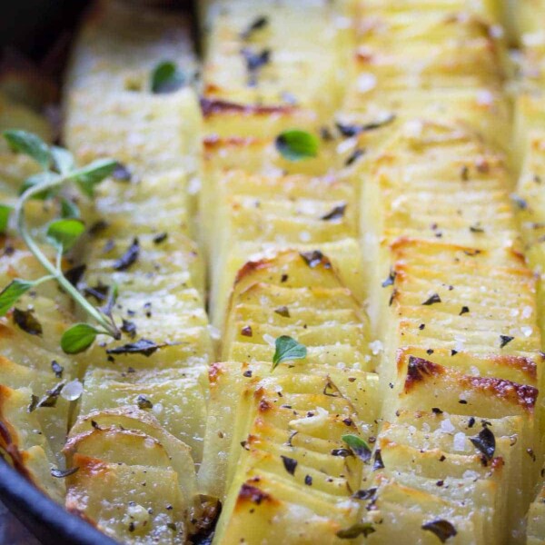 close up shot of salt and oregano domino potatoes