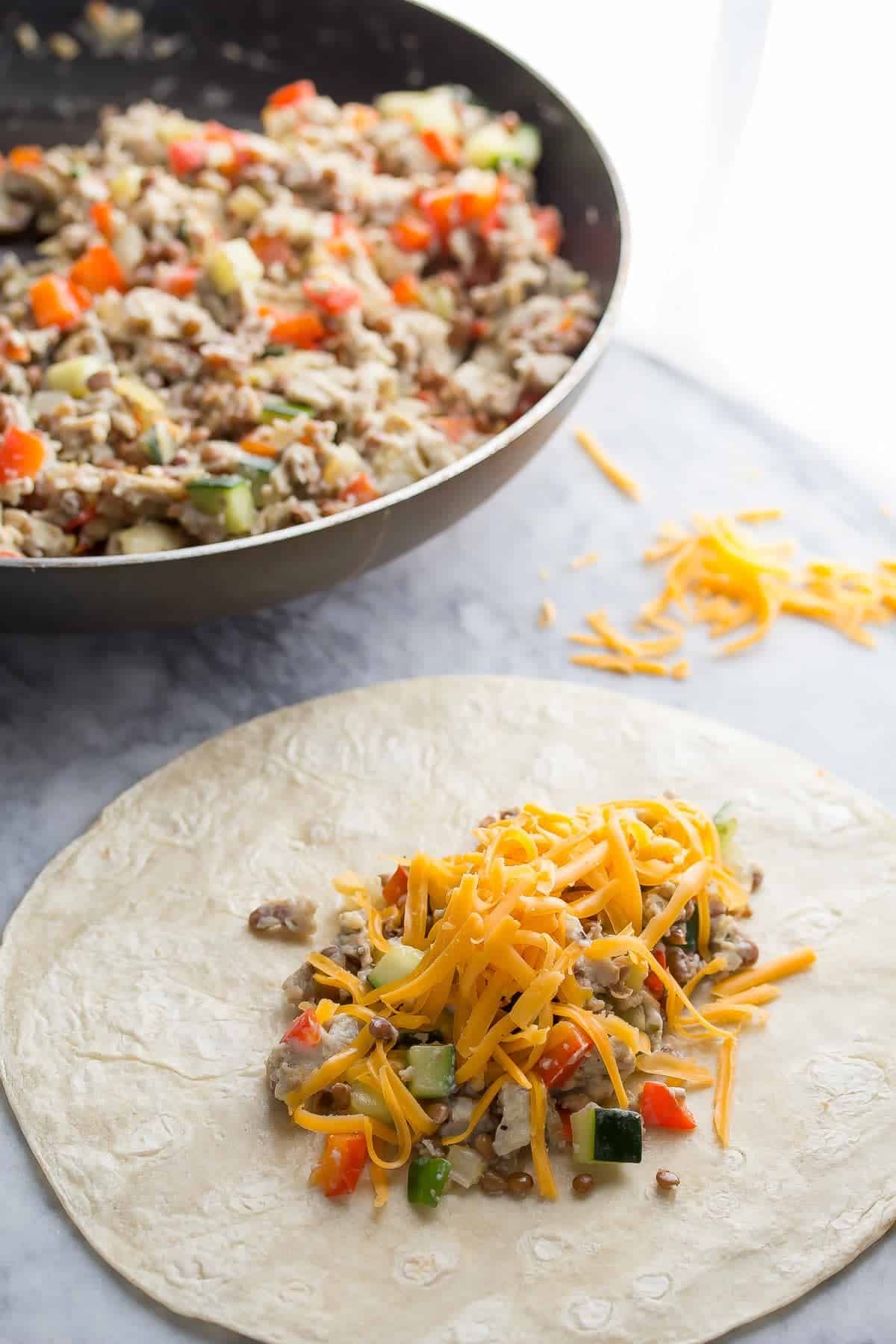 Healthy Breakfast Burritos with Zucchini & Lentils (Freezer), easy to make ahead, freeze and thaw as needed! Super filling and nutritious.