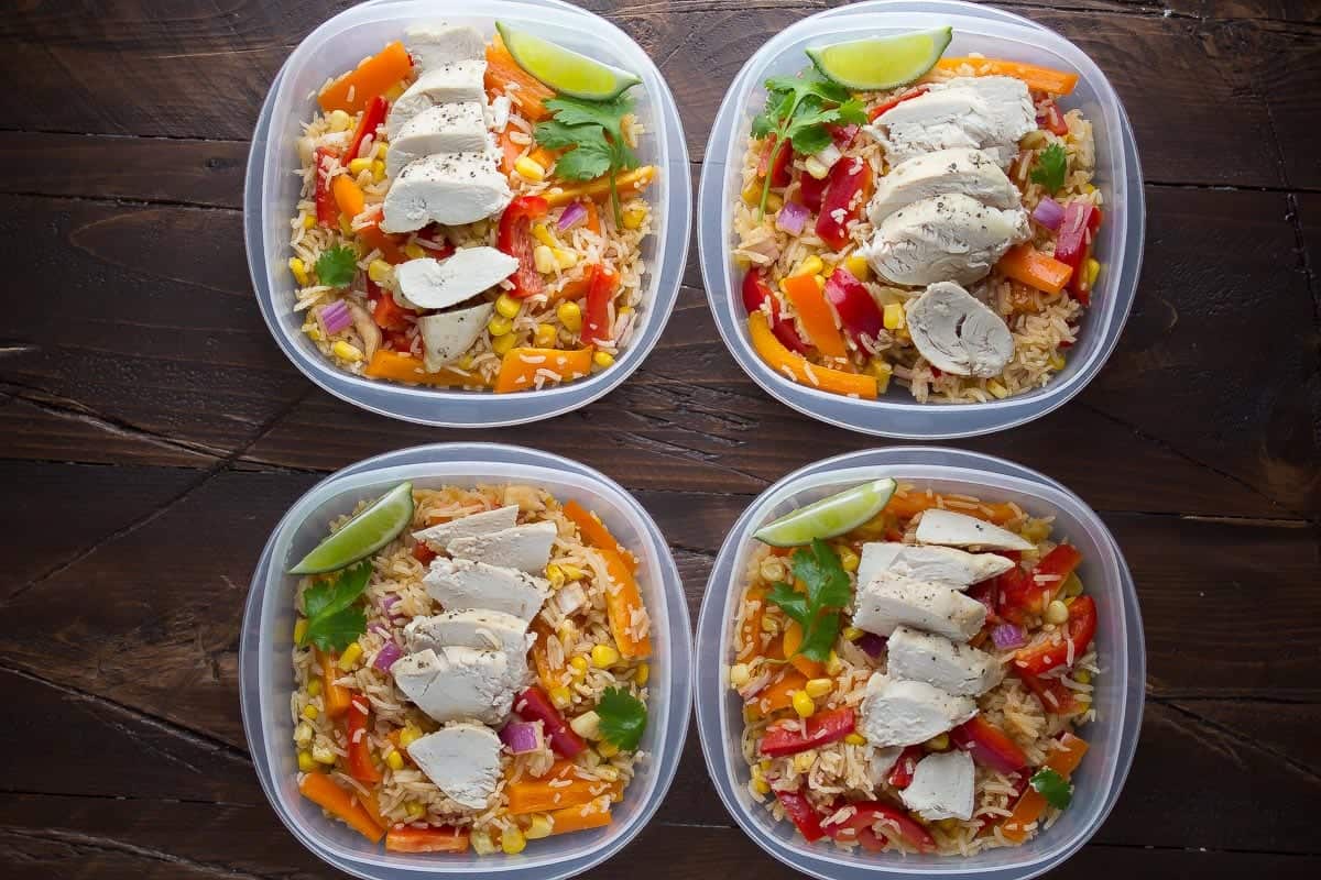 overhead view of four chicken fajita lunch bowls