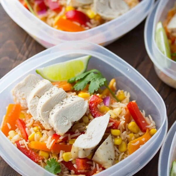 Meal prep containers filled with chicken fajita lunch bowls