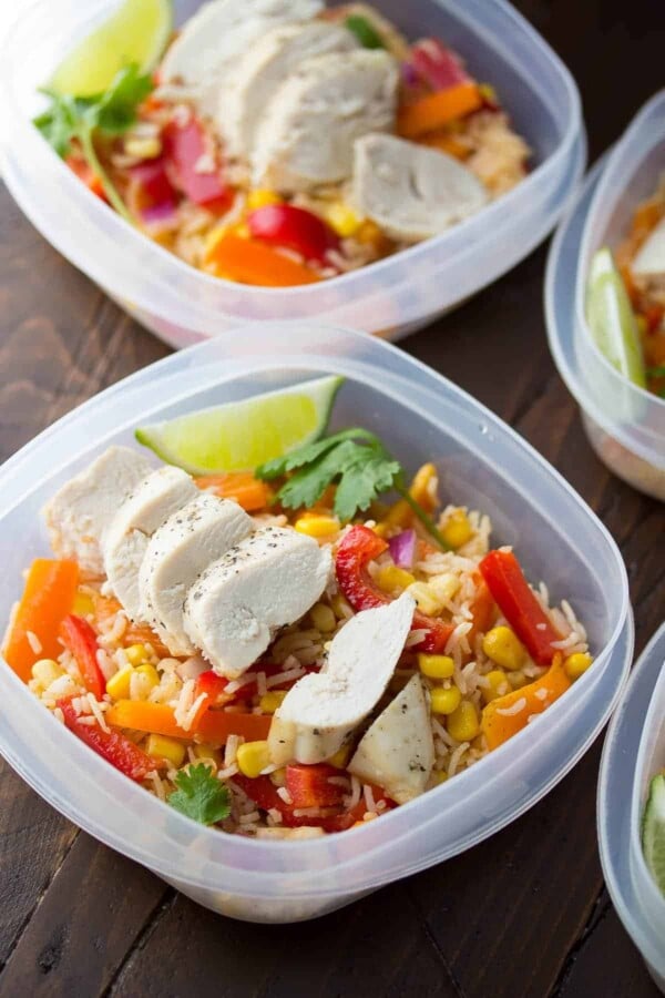 Meal prep containers filled with chicken fajita lunch bowls