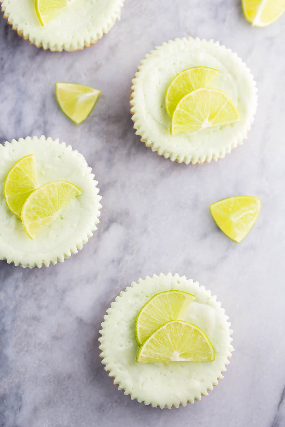 Key Lime Greek Yogurt Cheesecakes, a healthier dessert recipe with only 125 calories per cheesecake!